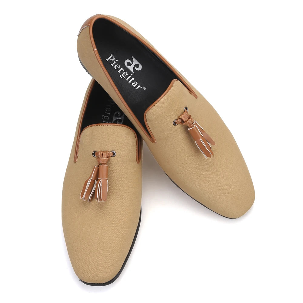 Men's canvas smoking slippers with leather tassel and two colors.