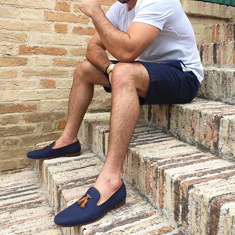 Men's canvas smoking slippers with leather tassel and two colors.