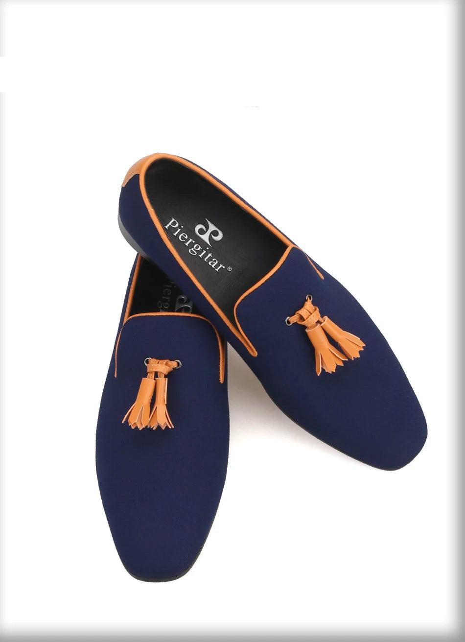 Men's canvas smoking slippers with leather tassel and two colors.