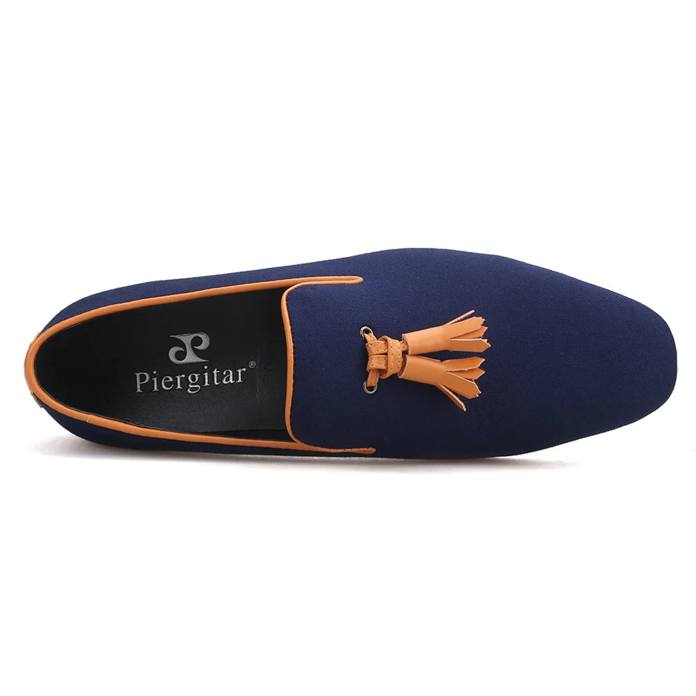 Men's canvas smoking slippers with leather tassel and two colors.