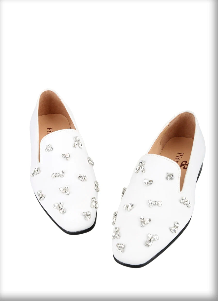 The same design red outsole moccasins with a smooth black crepe satin men's loafer.