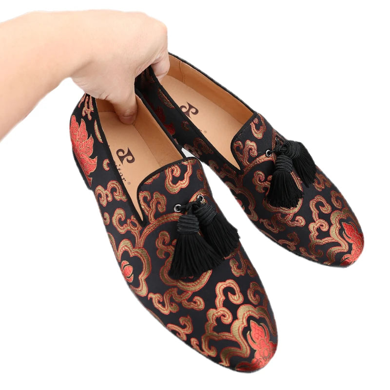 Men's smoking slippers with a Chinese style totem print and handcrafted tassels.
