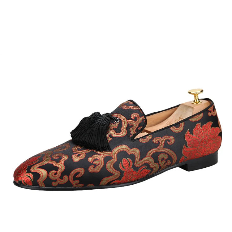 Men's smoking slippers with a Chinese style totem print and handcrafted tassels.