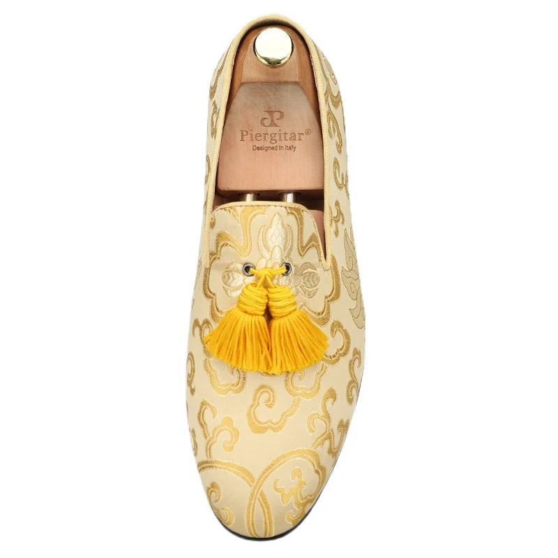Men's smoking slippers with a Chinese style totem print and handcrafted tassels.