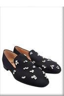 The same design red outsole moccasins with a smooth black crepe satin men's loafer.
