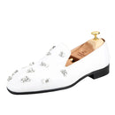 The same design red outsole moccasins with a smooth black crepe satin men's loafer.